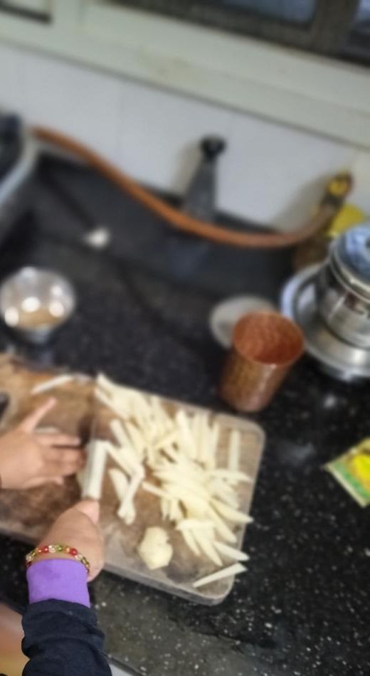 Little hands helping in the kitchen